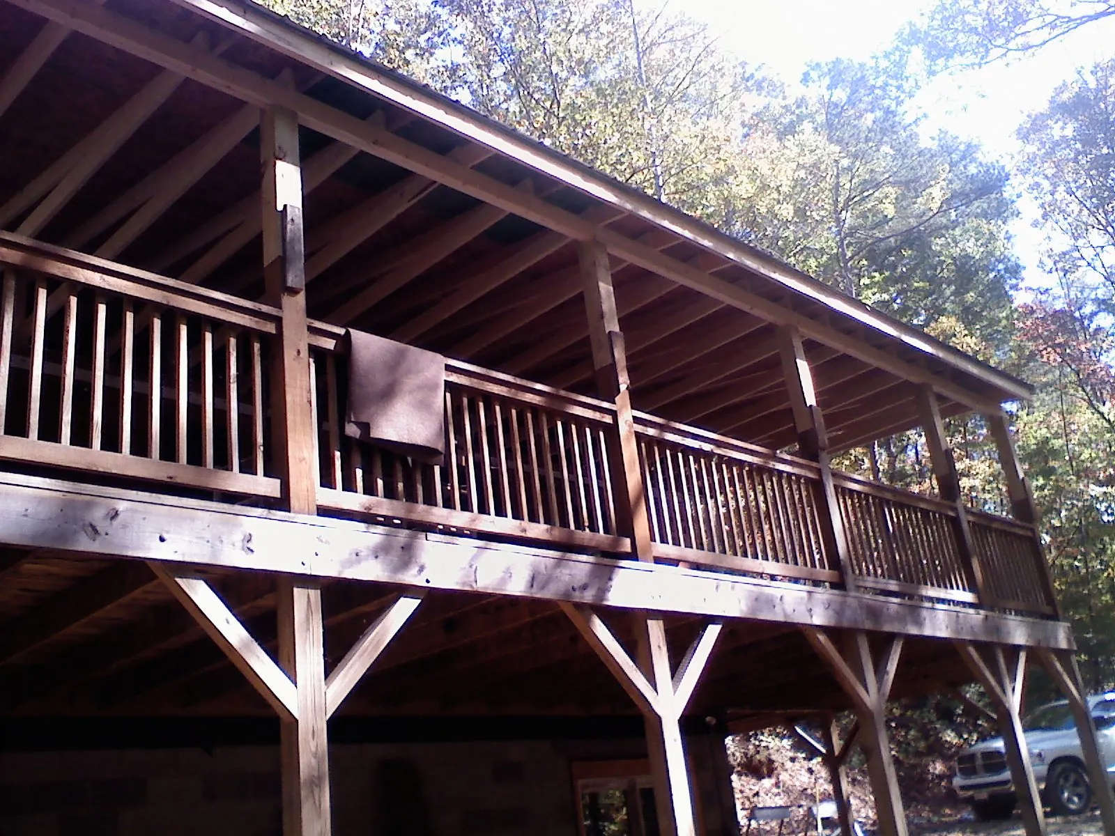 Timber framing under a new elevated porch and deck — Roof Leak Repair in King George by Roofing Brothers